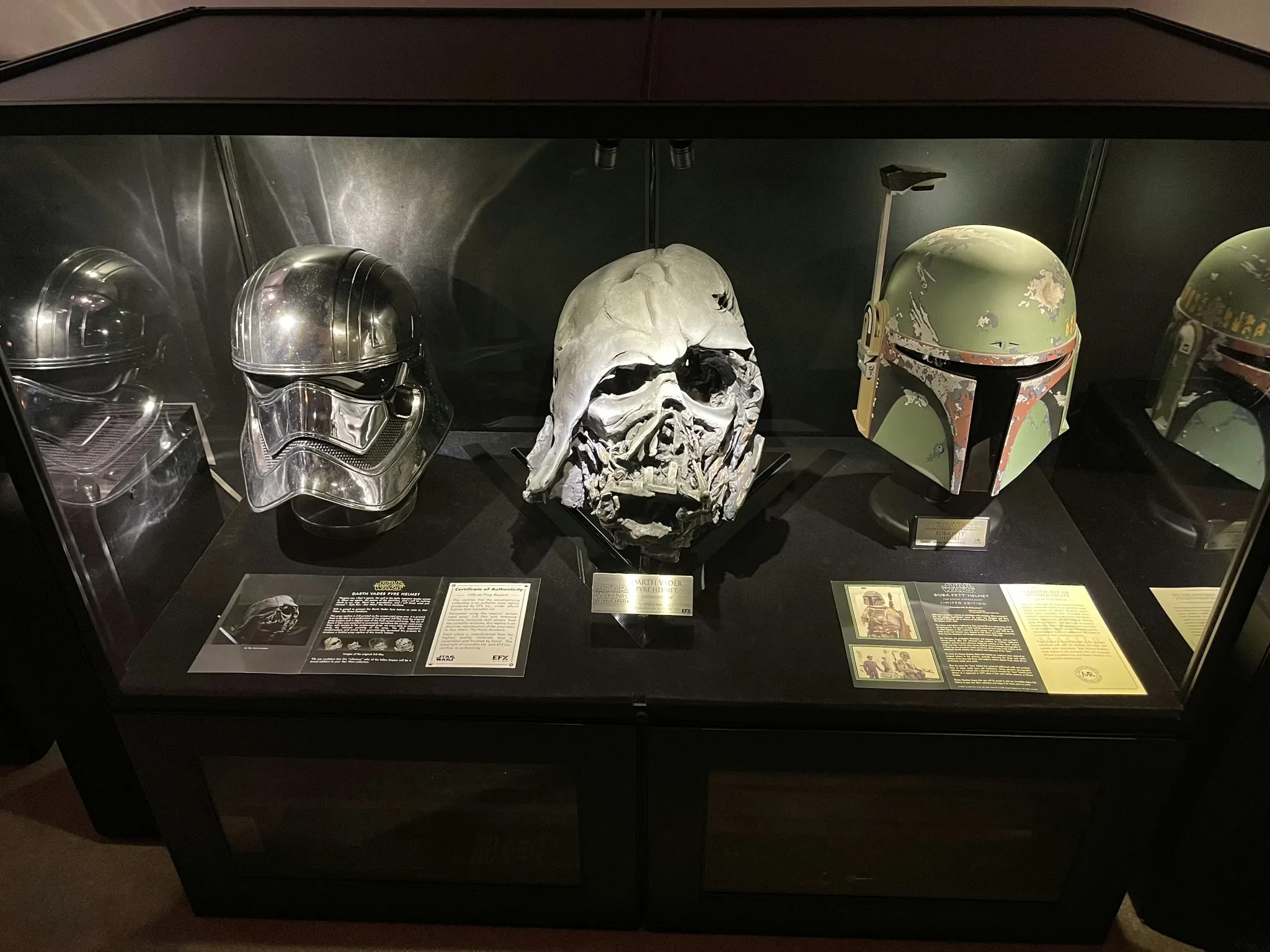 Star Wars helmet collection in a dark museum-style Moducase